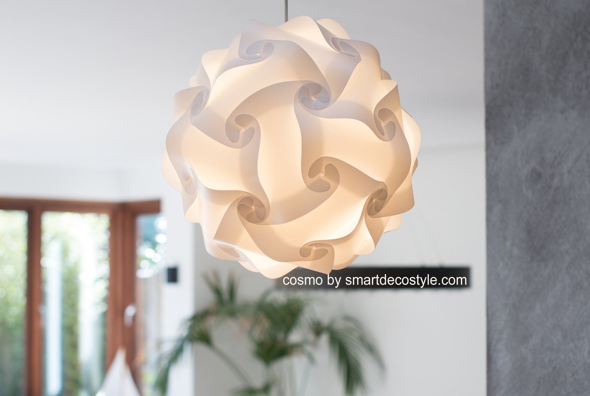 Intricate Spiral Lamp Shade: Modern, geometric white lighting fixture with a spiraling, nested design for contemporary home decor.
