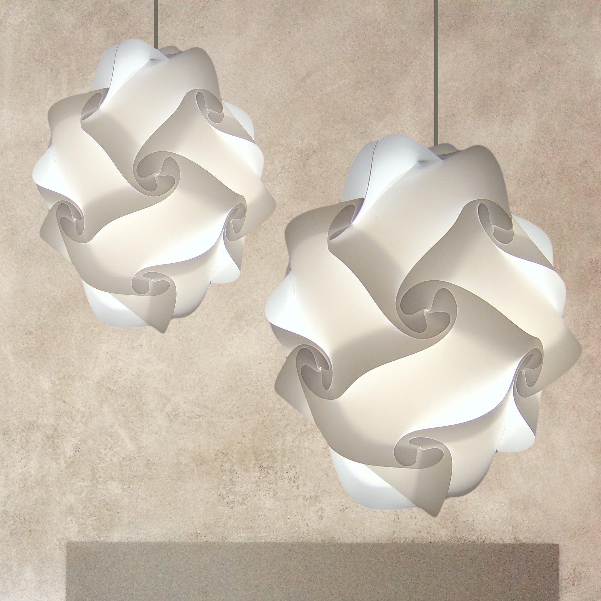 Elegant white modern pendant lamps, Swaine ceiling lampshades by Smarty Lamps, artistic lighting fixtures for home interior design.