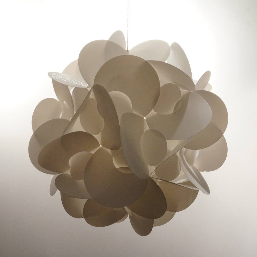 Elegant curved lampshade with organic, overlapping petal-like shapes in neutral tones, creating a soft, modern lighting fixture.